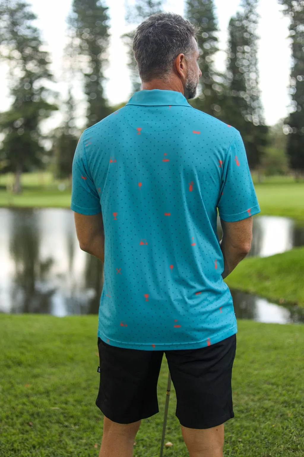 CA Statement Golf Shirt | Teal & Orange