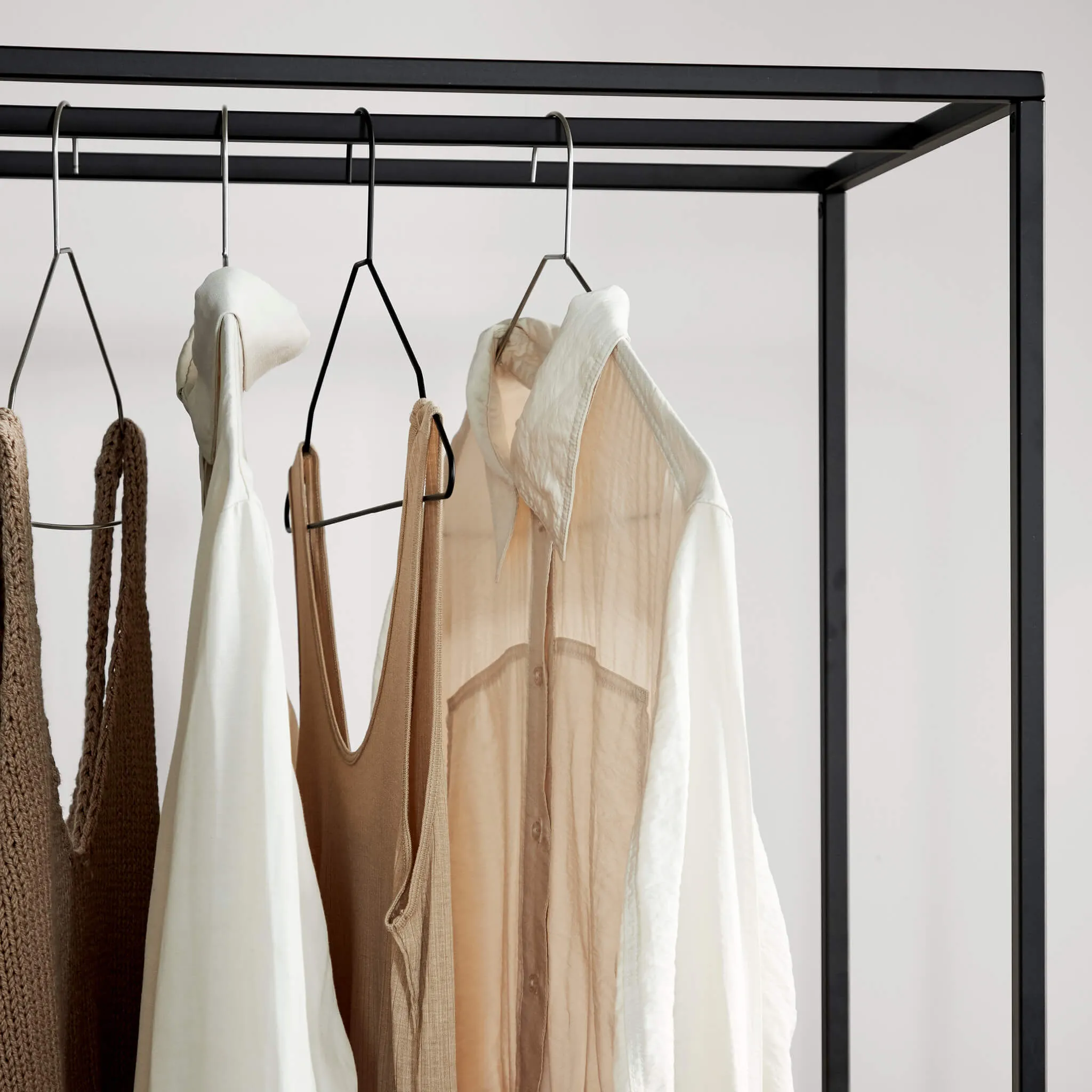 Hang'Em Coat Hanger
